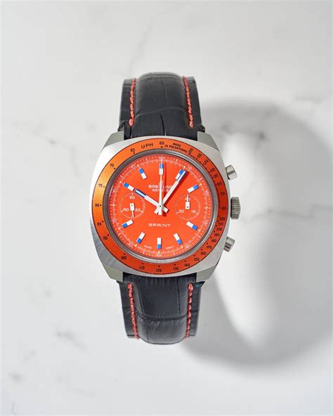 breitling holes code orange chronograph